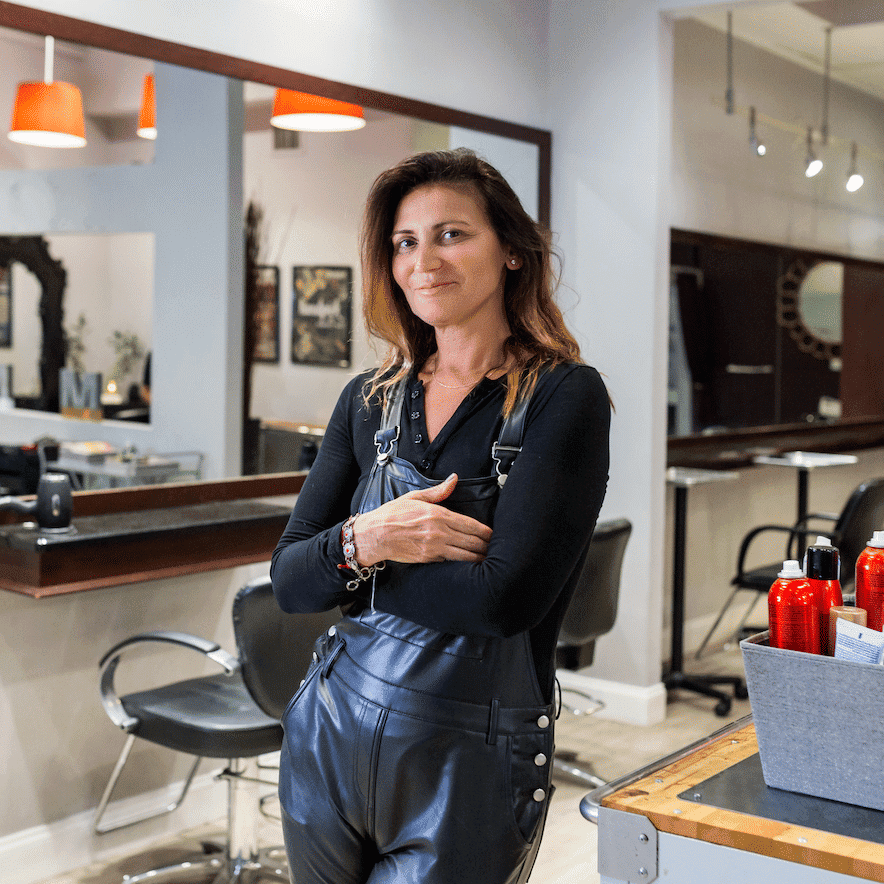 Portrait of Meredith Palmer, a professional stylist at Hibiscus Salon, showcasing their expertise and style.